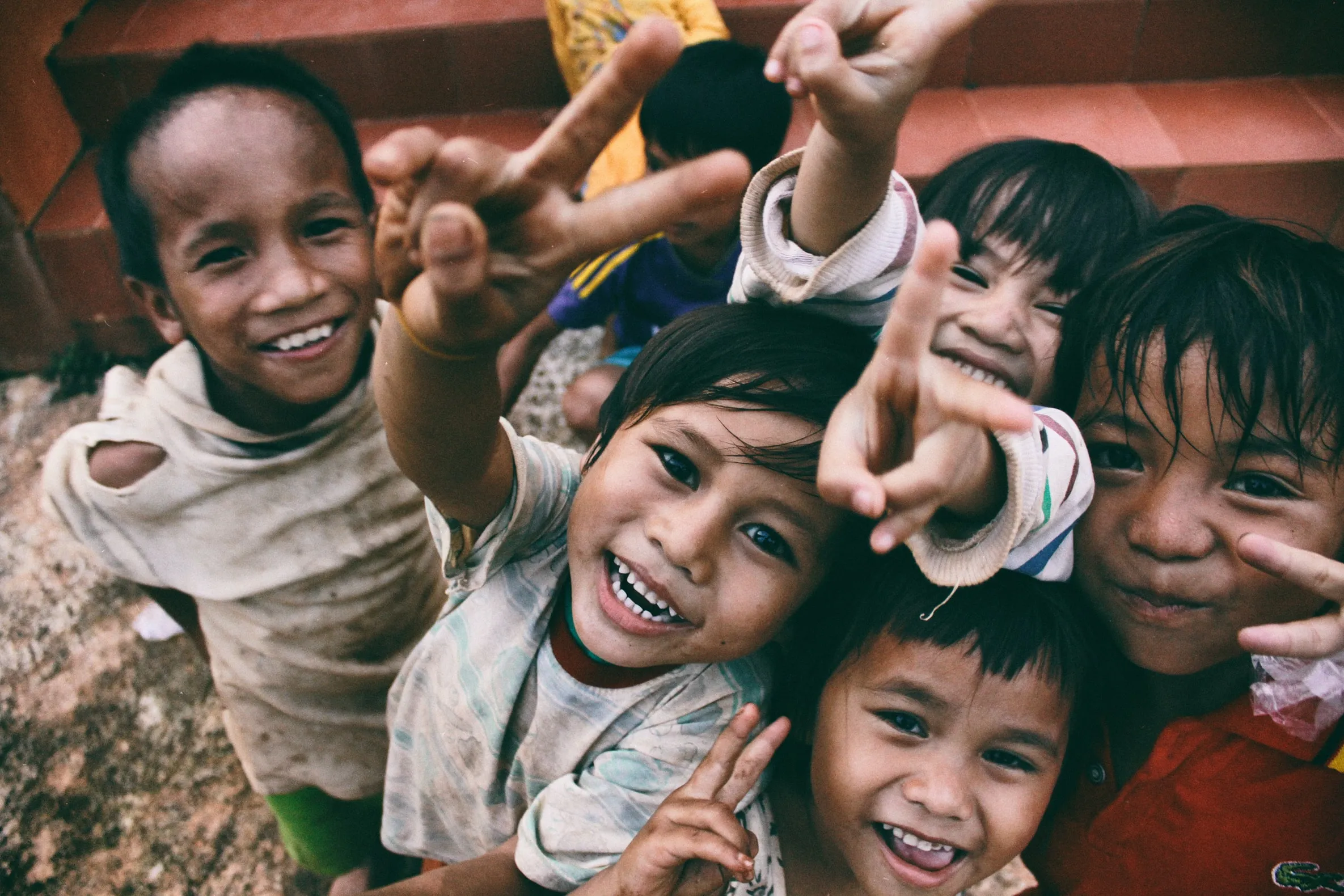 Group of children looking into camera